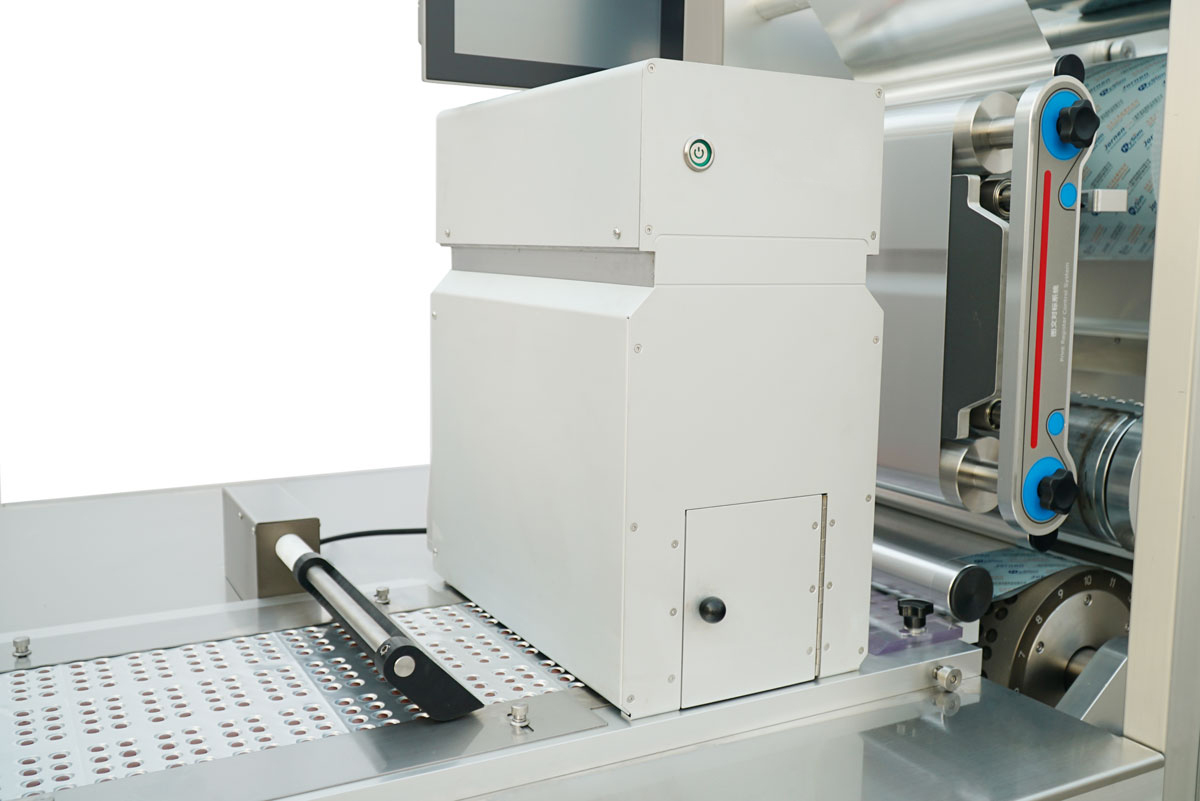 BMR270 Blister Machine - Vision Inspection System Integrated machine vision inspection system on the BMR270 high-speed blister packaging machine, utilizing advanced cameras to detect missing, broken, or incorrect solid doses for strict pharmaceutical quality control.
