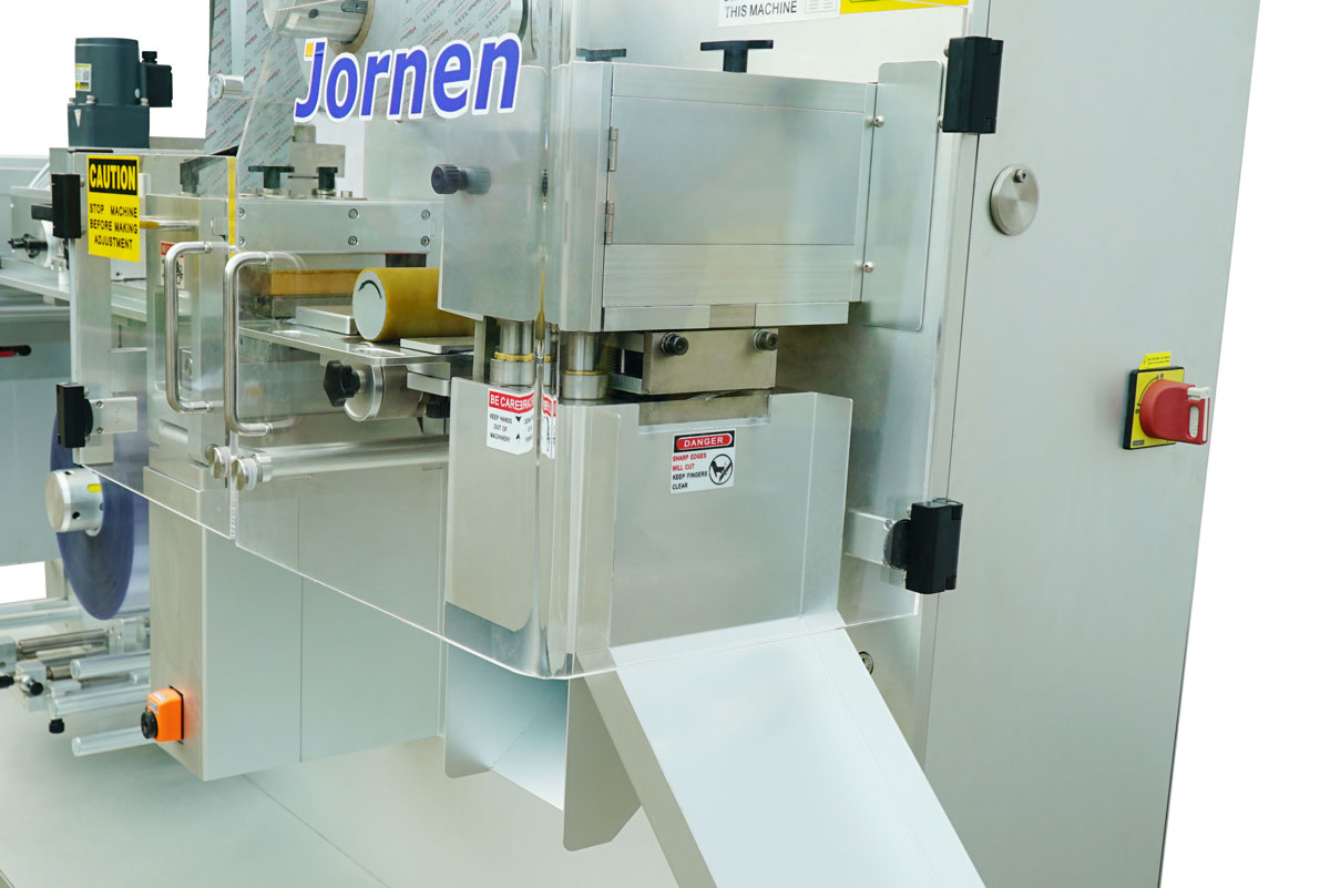 BMP100 Blister Machine Cutting Station Blister cutting station and waste material discharge of the Jornen BMP100 laboratory blister machine.