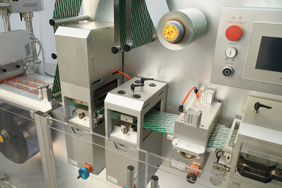 Embossing station on the JORNEN BMP180 compact blister packaging machine for precise batch coding and expiration dating