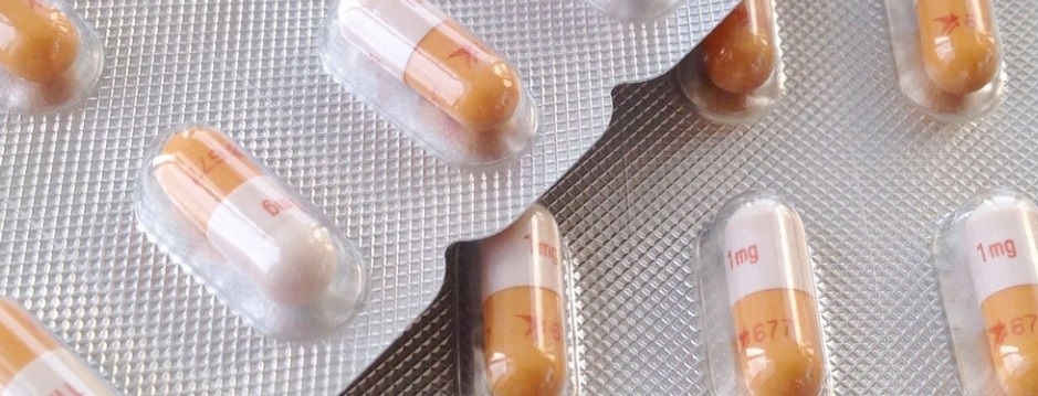 Transparent thermoformed blister pack showing capsules, illustrating the thermoforming packaging process